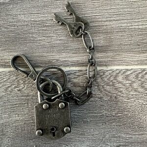 Free people we the free silver lock key chain